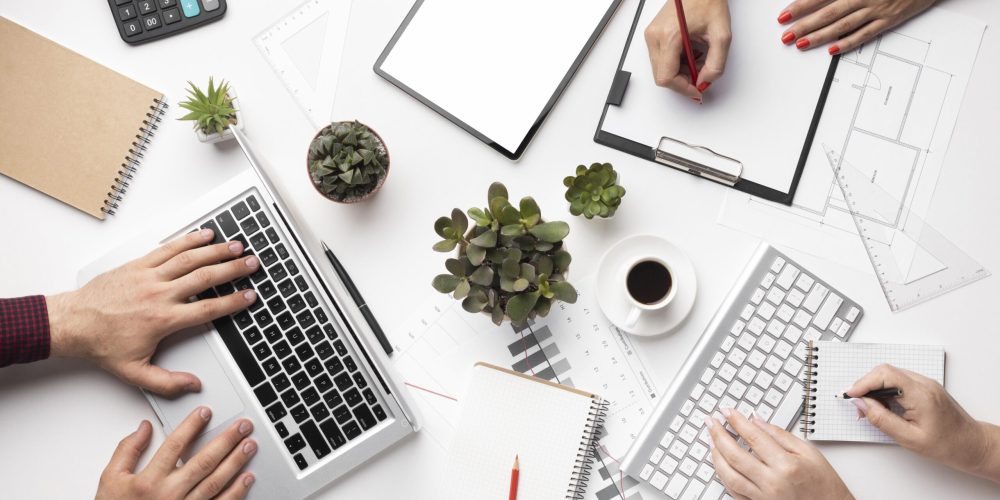 flat-lay-office-desk-assortment-with-empty-screen-tablet